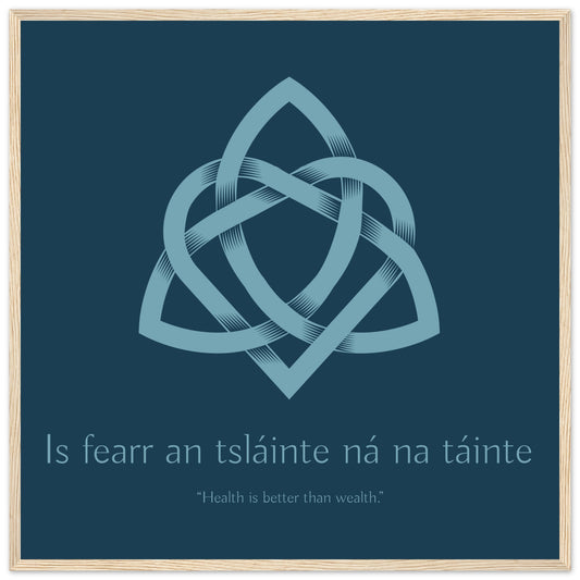 Is fearr an tsláinte ná na táinte print in an oak frame, Celtic trinity knot and heart on navy blue