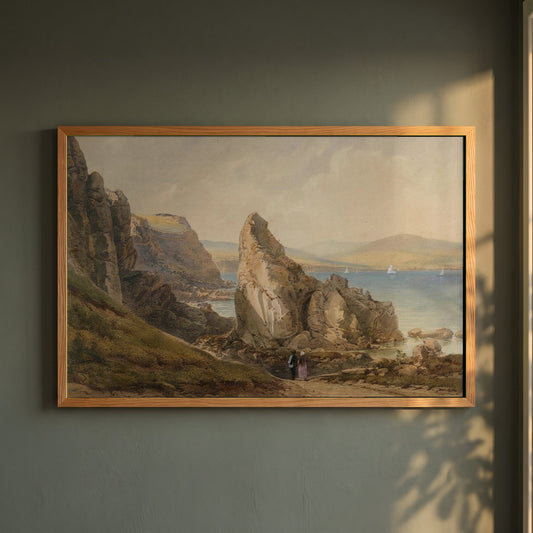 A Bay near Howth framed print in a natural oak frame on a dark green wall beside a window, dappled plant shadow