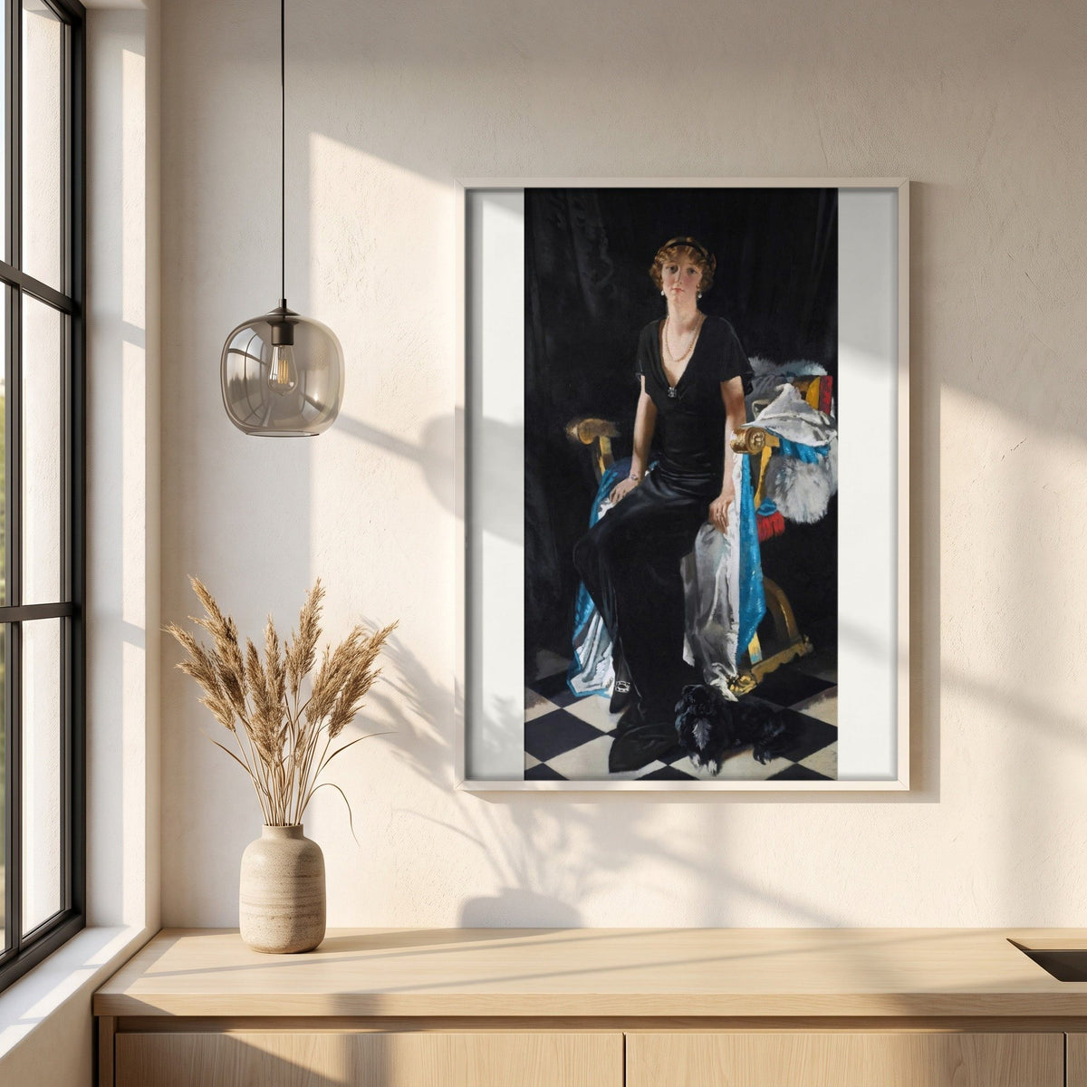 Idina Wallace framed print in a white frame on a plaster wall above an oak worktop in a bright Scandinavian kitchen