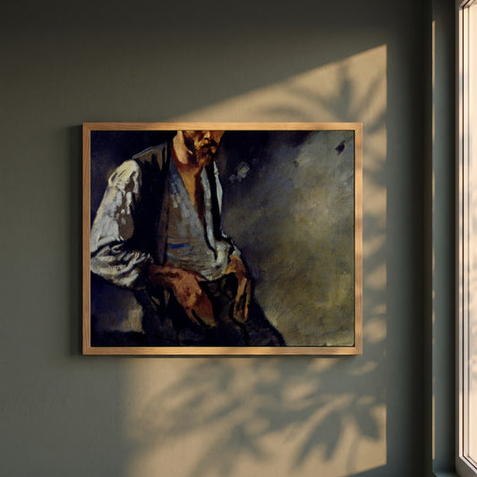 Man of the West, Seán Keating framed print in a natural oak frame on a dark green wall beside a window, dappled plant shadow