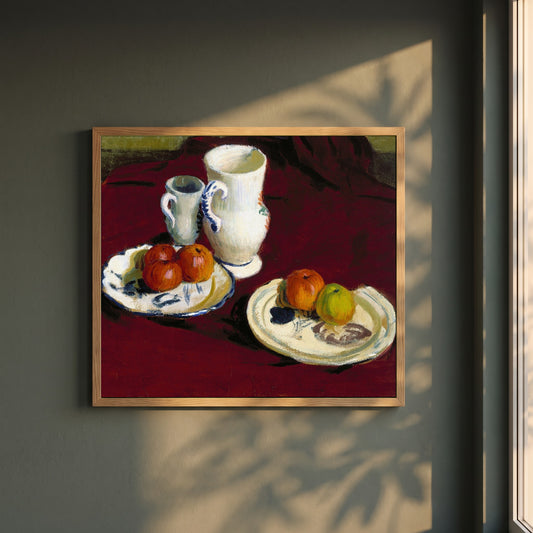 Apples and Breton Pots framed print in a natural oak frame on a dark green wall beside a window, dappled plant shadow