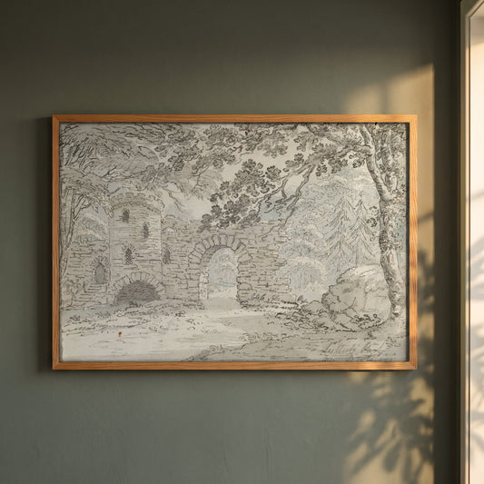 The Rustic Arch, Luttrelstown Castle framed print in a natural oak frame on a dark green wall beside a window, dappled plant shadow