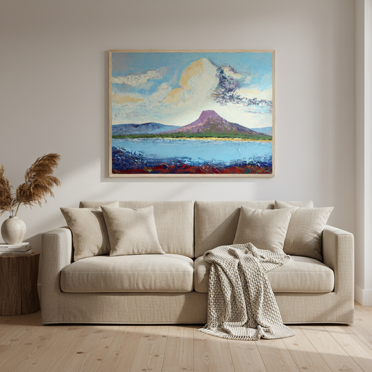 Lurig Mountain from the Shore, Cushendall, by Barra Ó Maoláin, framed in oak above a linen sofa