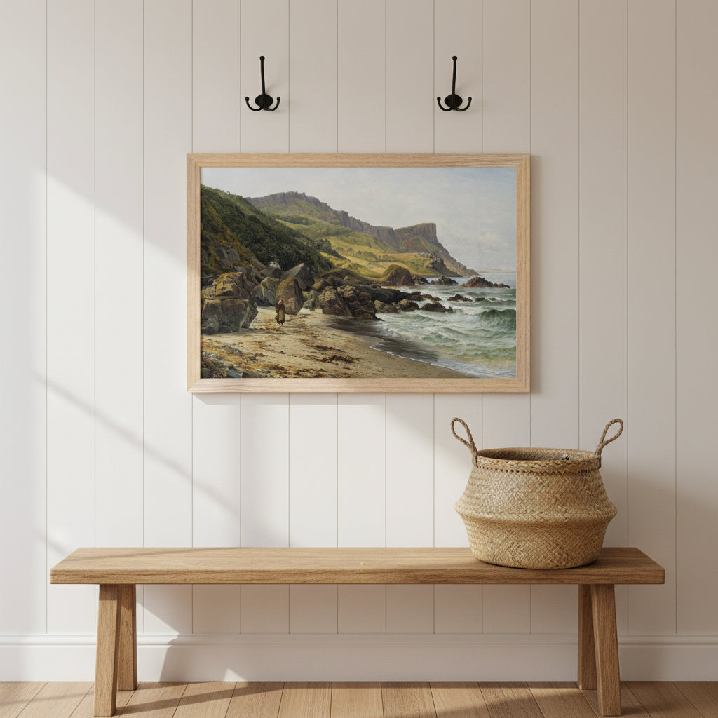 Murlough Bay and Fair Head print in a natural wood frame above a bench in a panelled hallway