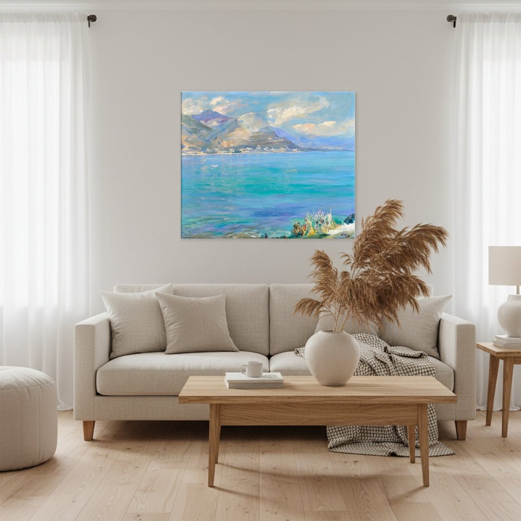 Beaulieu by Sir John Lavery (1921) canvas art print featuring turquoise Mediterranean waters, mountains, and soft sky – Irish artist reproduction. A bright Scandinavian living room with neutral tones, oak furniture, soft linen textures, and pampas grass. A 50×60 cm canvas of Beaulieu by Sir John Lavery hangs centered above a minimalist sofa. Soft natural daylight, calm coastal aesthetic, curated feminine interior styling.