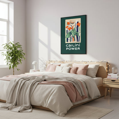 Framed print above a pastel bed with linen blankets, fairy lights, feminist books stacked on bedside table, airy natural daylight.