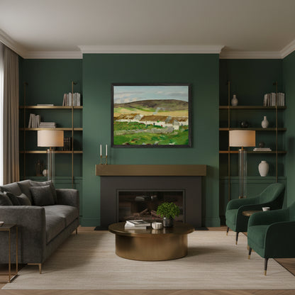 Irish landscape print of white thatched cottages and green hills, unframed 40×50 cm museum-quality matte paper. Black framed Irish landscape art print above a modern fireplace, deep green walls, brass accents, warm evening light, upscale contemporary Irish home.
