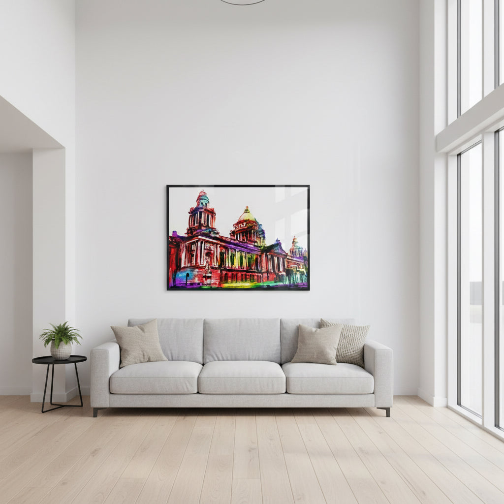 Large 60x80 cm Belfast City Hall framed print in slim black frame, feature piece above a three-seater sofa, white wall, high-ceiling living room, wooden floor, subtle reflections on plexiglass, realistic wide-angle interior shot.
