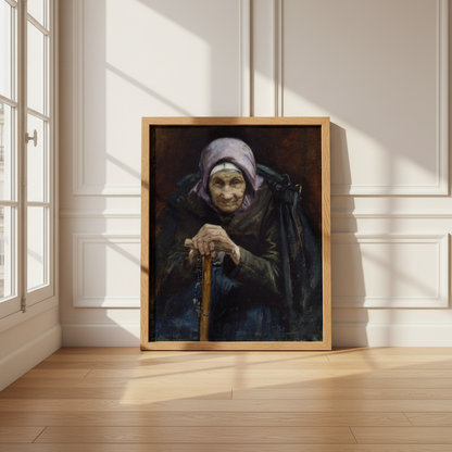 Fisherman's Mother print in an oak frame leaning against a panelled white wall on a wooden floor