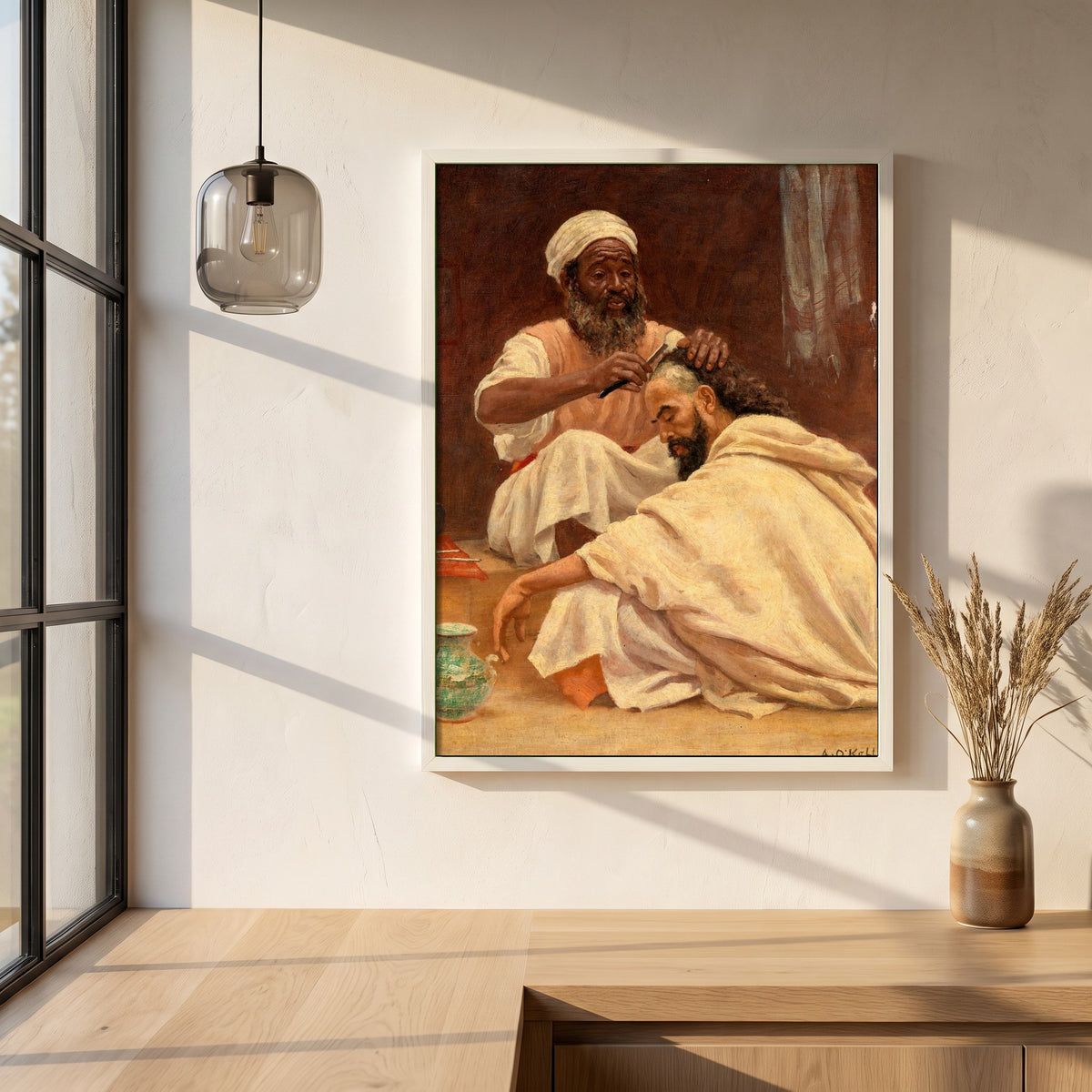 A Barber, Morocco framed print in a white frame on a plaster wall above an oak worktop in a bright Scandinavian kitchen