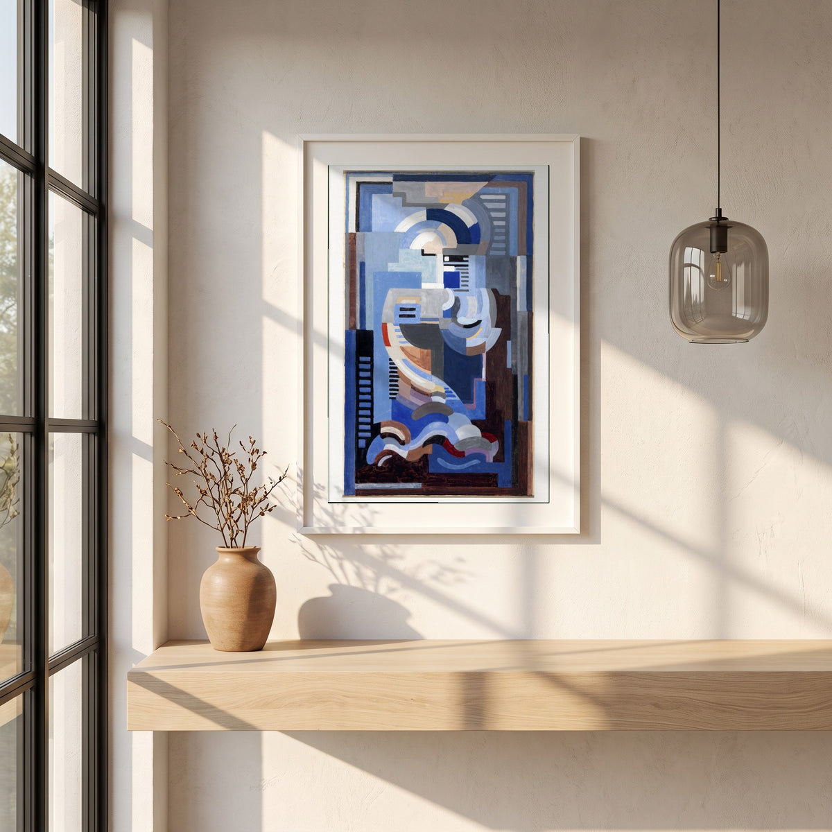 Abstract Blue Composition framed print in a white frame on a plaster wall above an oak worktop in a bright Scandinavian kitchen