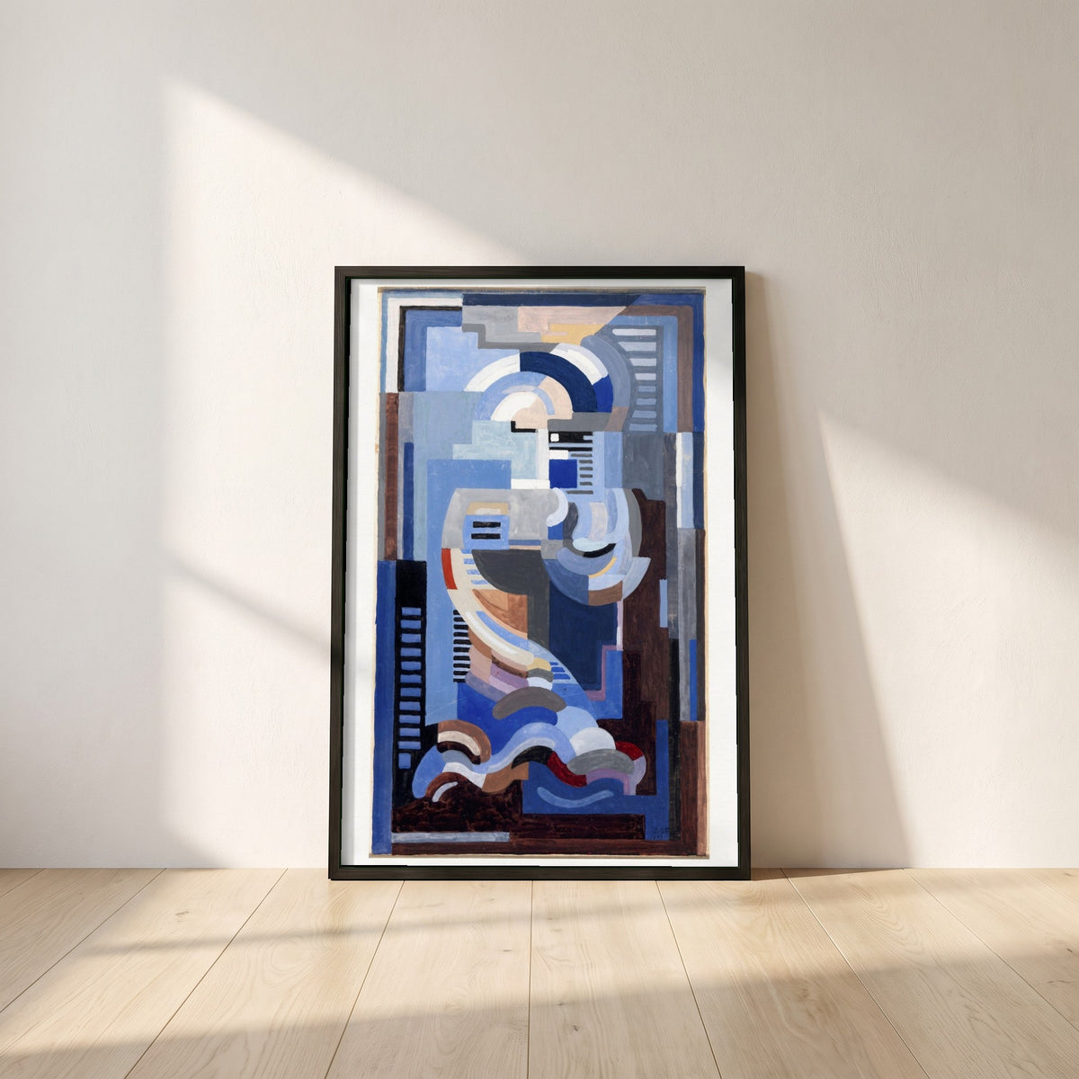 Abstract Blue Composition framed print in a black frame leaning against a white plaster wall on oak floorboards in morning light