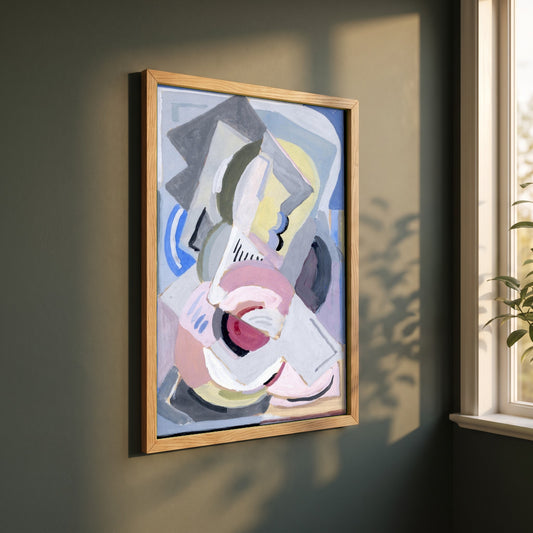 Abstract framed print in a natural oak frame on a dark green wall beside a window, dappled plant shadow