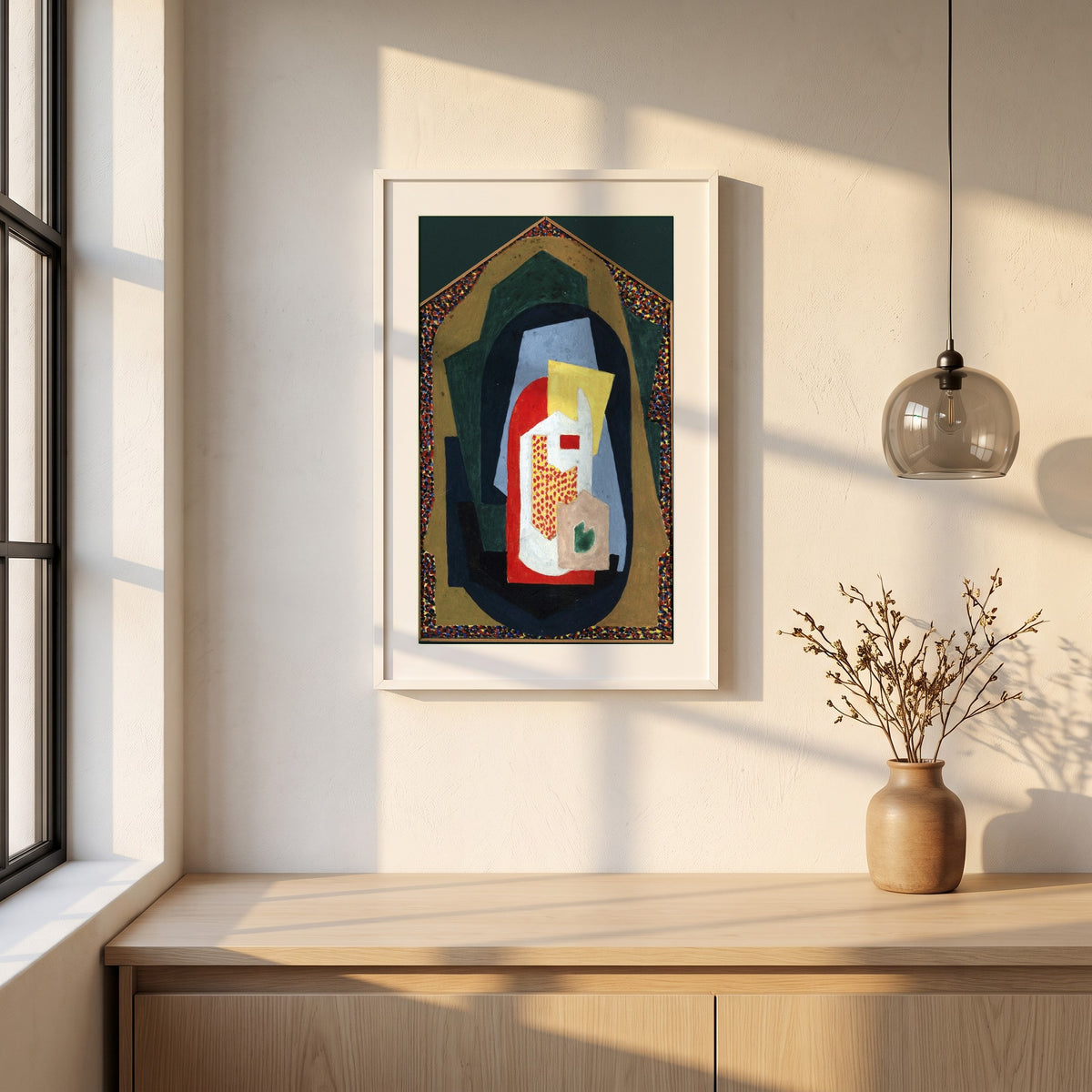 Decoration framed print in a white frame on a plaster wall above an oak worktop in a bright Scandinavian kitchen