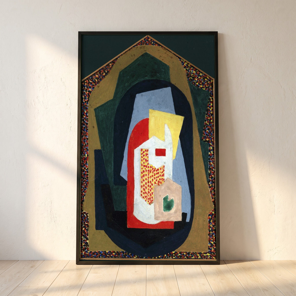 Decoration framed print in a black frame leaning against a white plaster wall on oak floorboards in morning light