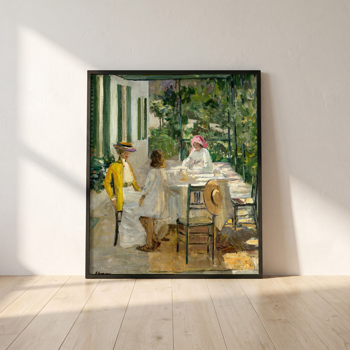 After Breakfast, Tangier framed print in a black frame leaning against a white plaster wall on oak floorboards in morning light