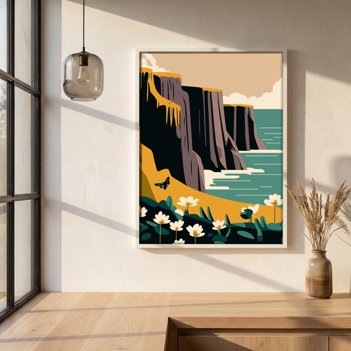 Cliffs of Moher, County Clare framed print in a white frame on a plaster wall above an oak worktop in a bright Scandinavian kitchen