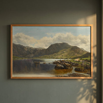Cloon Lake, Glencar, Co. Kerry framed print in a natural oak frame on a dark green wall beside a window, dappled plant shadow
