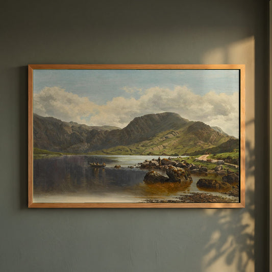 Cloon Lake, Glencar, Co. Kerry framed print in a natural oak frame on a dark green wall beside a window, dappled plant shadow