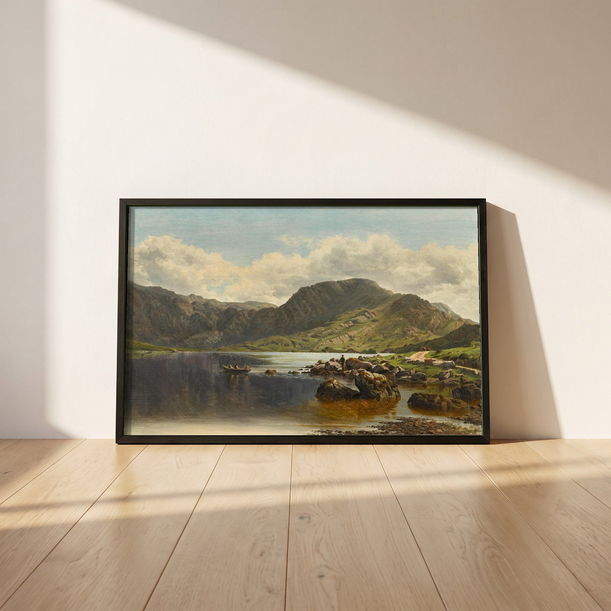 Cloon Lake, Glencar, Co. Kerry framed print in a black frame leaning against a white plaster wall on oak floorboards in morning light