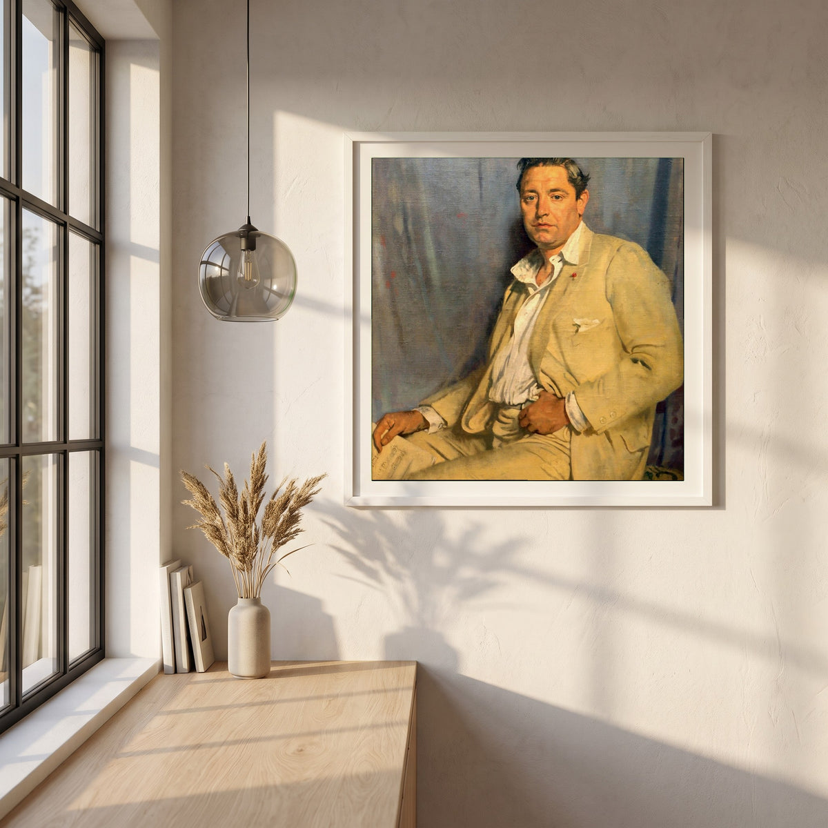 Count John McCormack framed print in a white frame on a plaster wall above an oak worktop in a bright Scandinavian kitchen