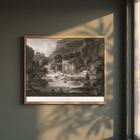 Eden Vale by Thomas Sautelle Roberts Art Print framed print in a natural oak frame on a dark green wall beside a window, dappled plant shadow