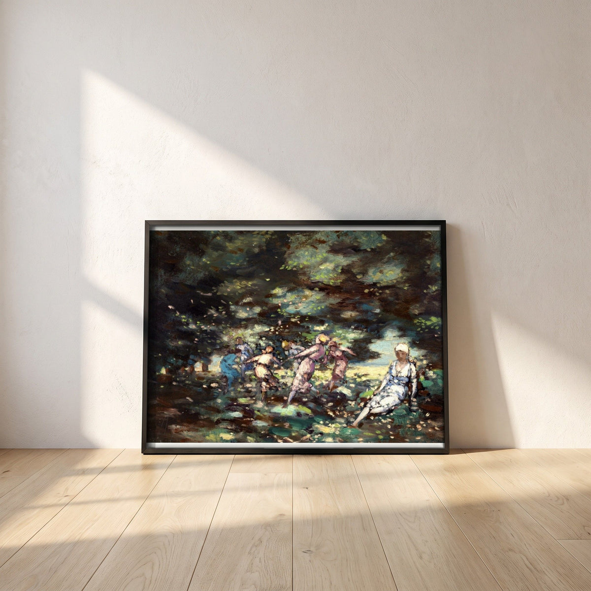 Fairies in a Wood by George Russell (Æ) framed print in a black frame leaning against a white plaster wall on oak floorboards in morning light