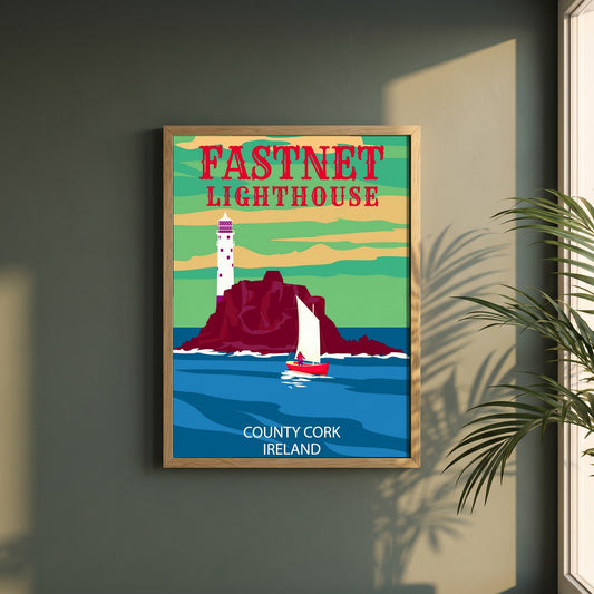 Fastnet Lighthouse County Cork Ireland Travel Retro framed print in a natural oak frame on a dark green wall beside a window, dappled plant shadow