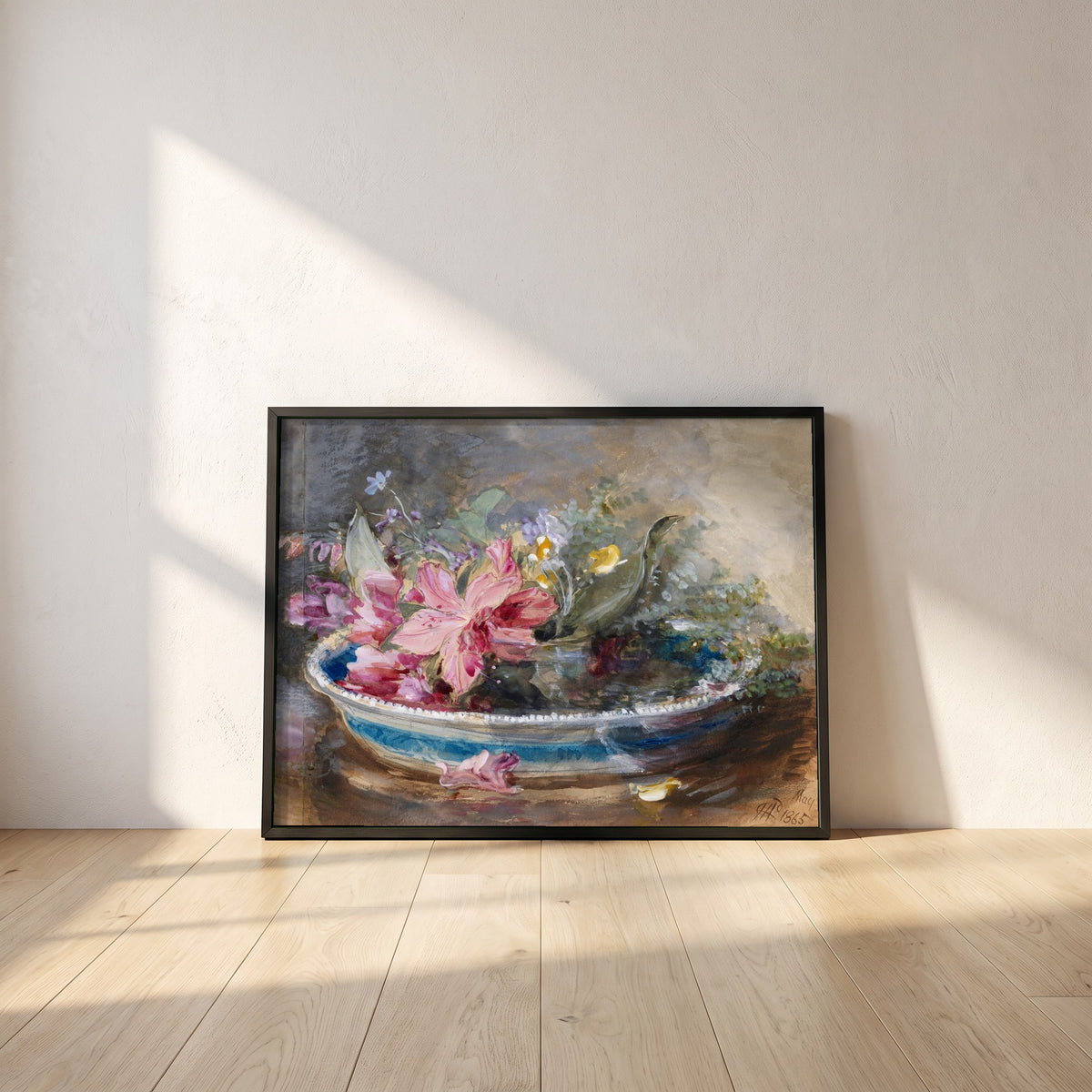 Flowers in a Bowl framed print in a black frame leaning against a white plaster wall on oak floorboards in morning light