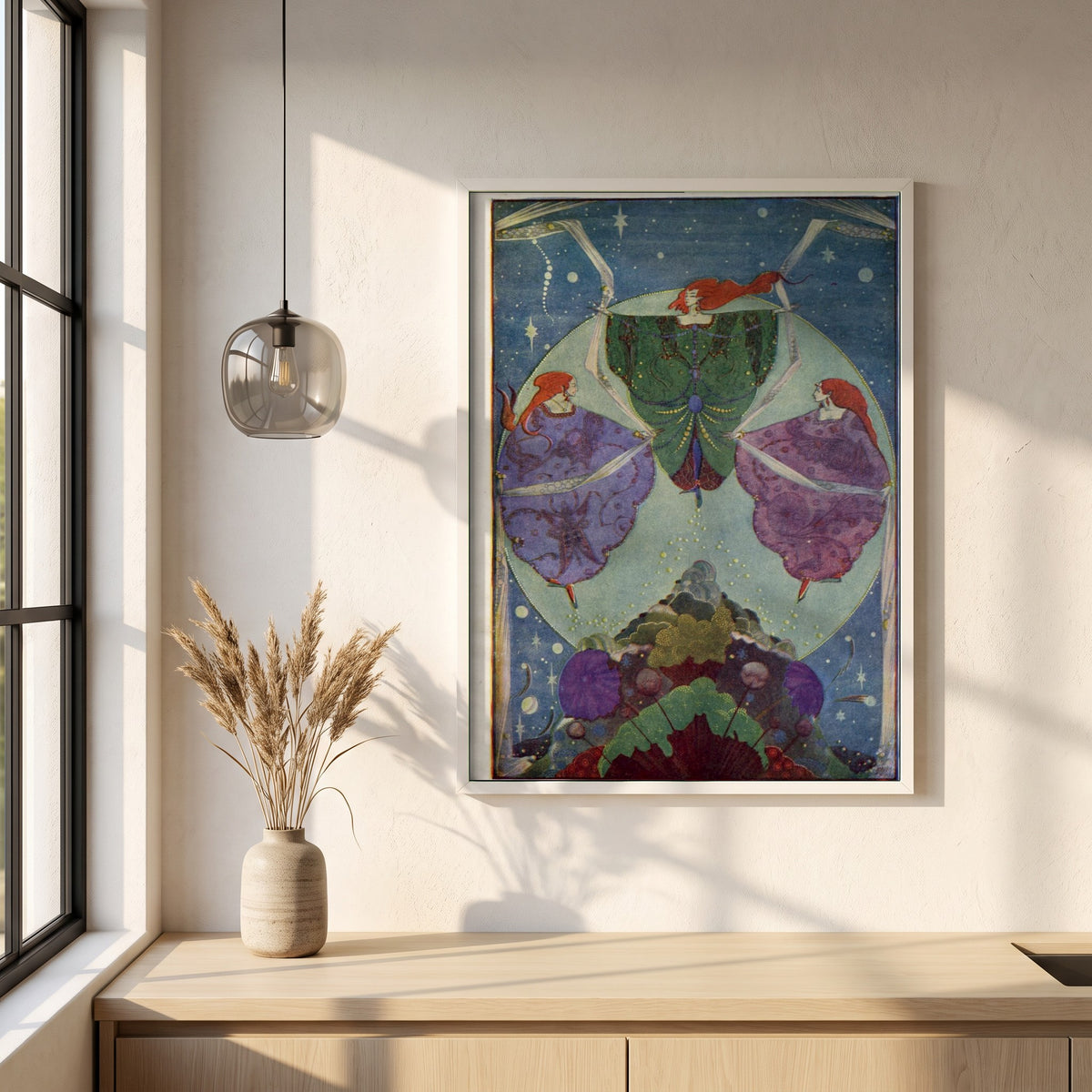 Harry Clarke framed print in a white frame on a plaster wall above an oak worktop in a bright Scandinavian kitchen