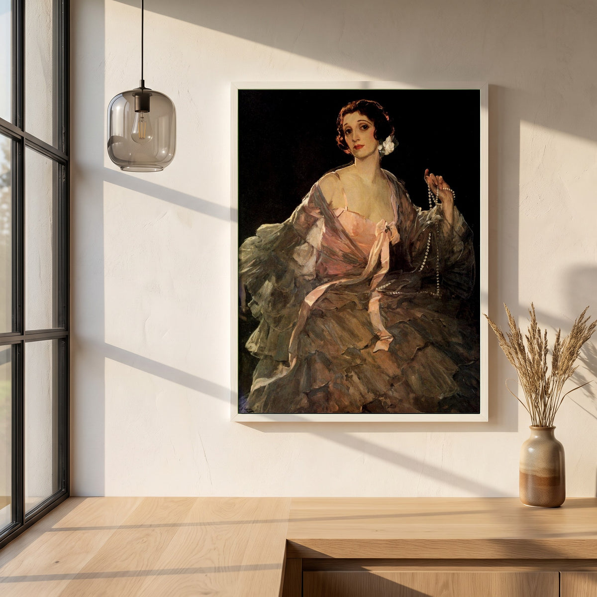 Hazel in Rose and Grey framed print in a white frame on a plaster wall above an oak worktop in a bright Scandinavian kitchen