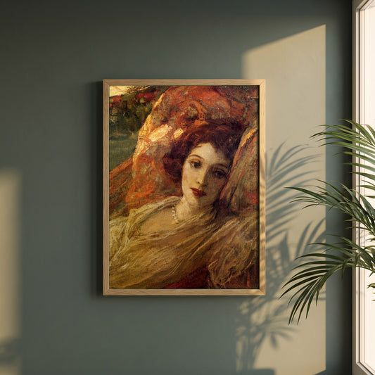 The Red Hammock framed print in a natural oak frame on a dark green wall beside a window, dappled plant shadow