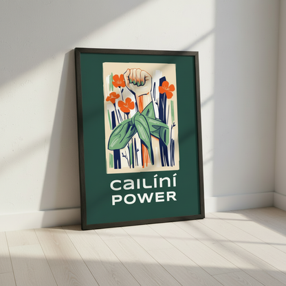Cailíní Power feminist art print in a black frame leaning against a white wall in soft sunlight