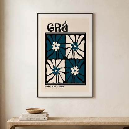 Grá Irish language print in a black frame above a low wooden bench with books