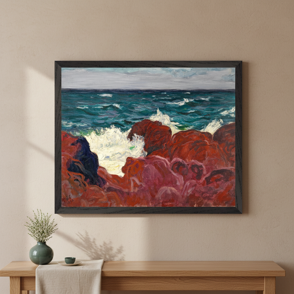 Red Rocks and Sea by Roderic O'Conor framed print in a black frame above a wooden side table on a beige wall