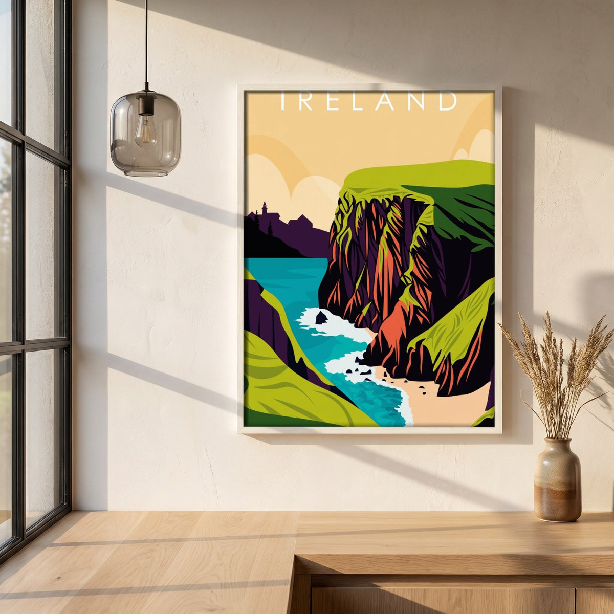 Ireland retro travel poster, Cliffs of Moher, in a white frame on a plaster wall above an oak worktop in a bright Scandinavian kitchen