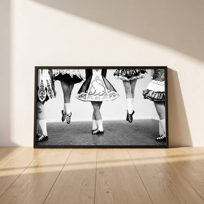 Irish Dancing Black & White framed print in a black frame leaning against a white plaster wall on oak floorboards in morning light