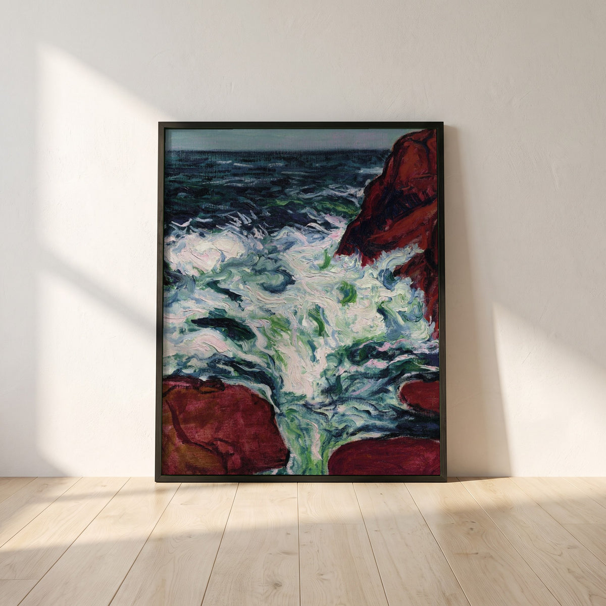 Marée Montante framed print in a black frame leaning against a white plaster wall on oak floorboards in morning light
