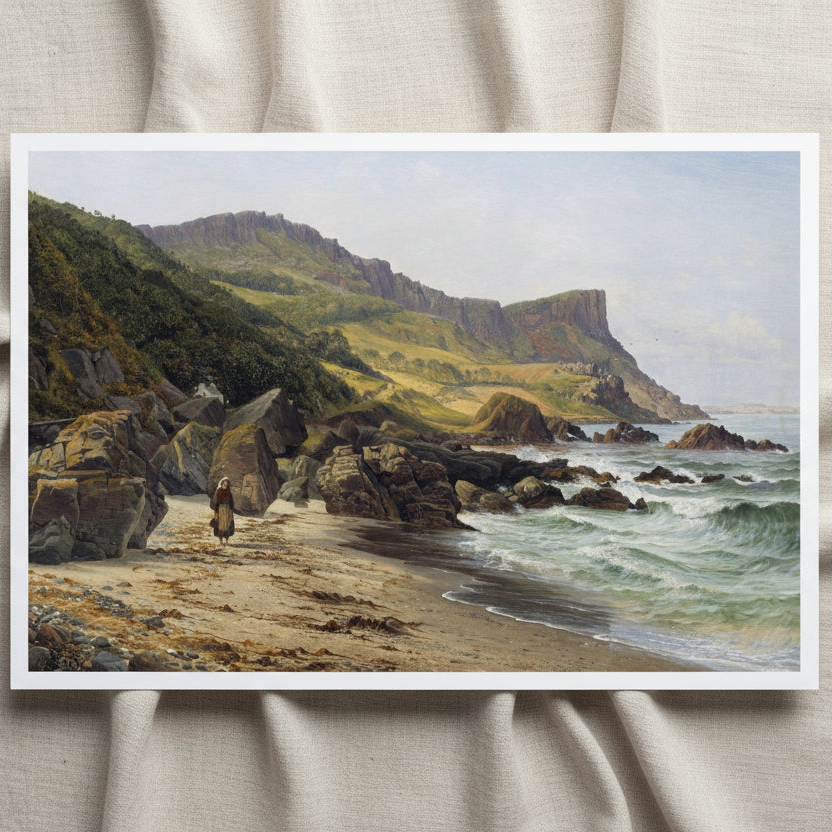 Unframed Murlough Bay and Fair Head archival art print resting on light linen fabric in soft daylight
