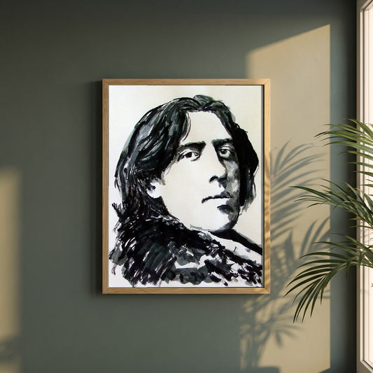 Oscar Wilde framed print in a natural oak frame on a dark green wall beside a window, dappled plant shadow