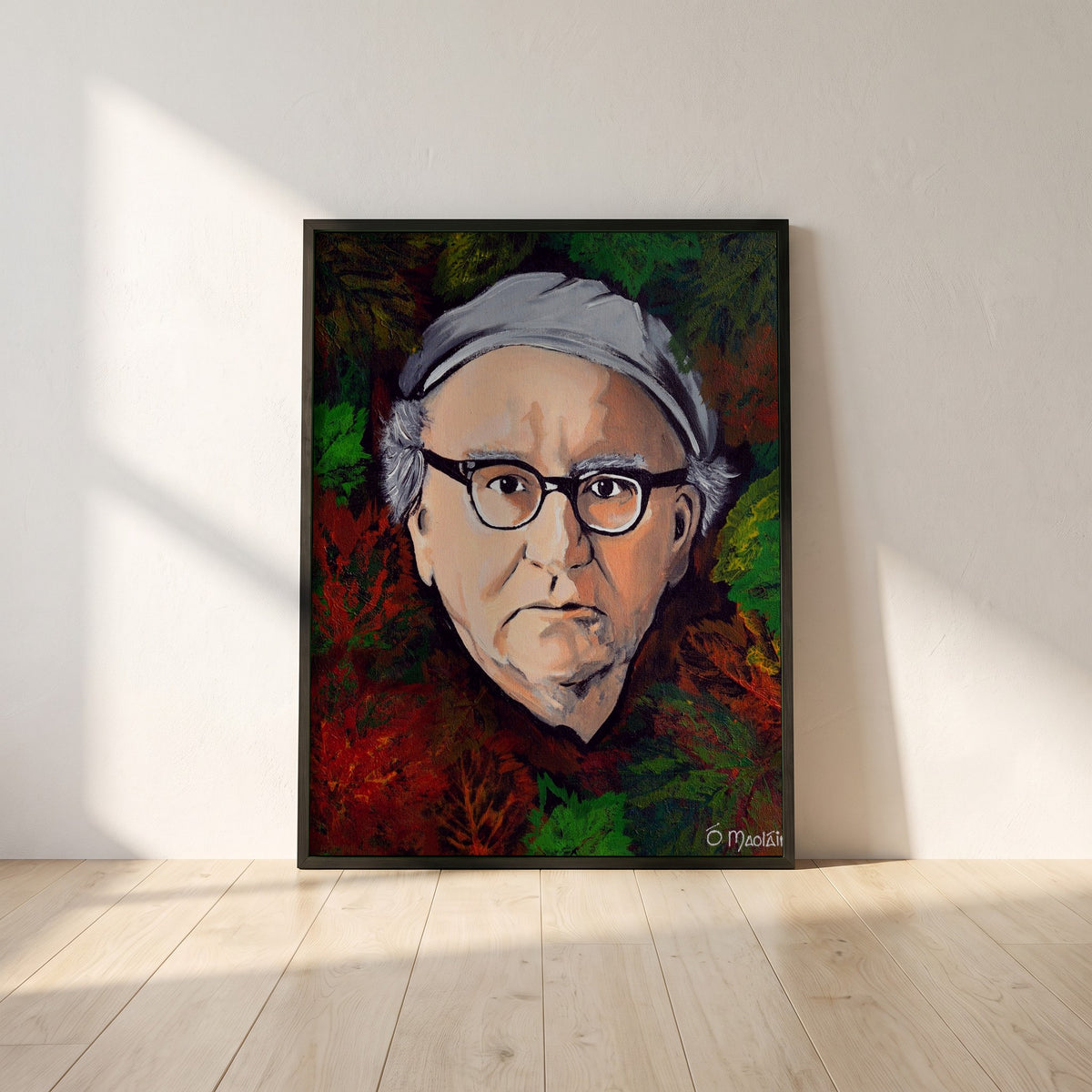 Patrick Kavanagh framed print in a black frame leaning against a white plaster wall on oak floorboards in morning light