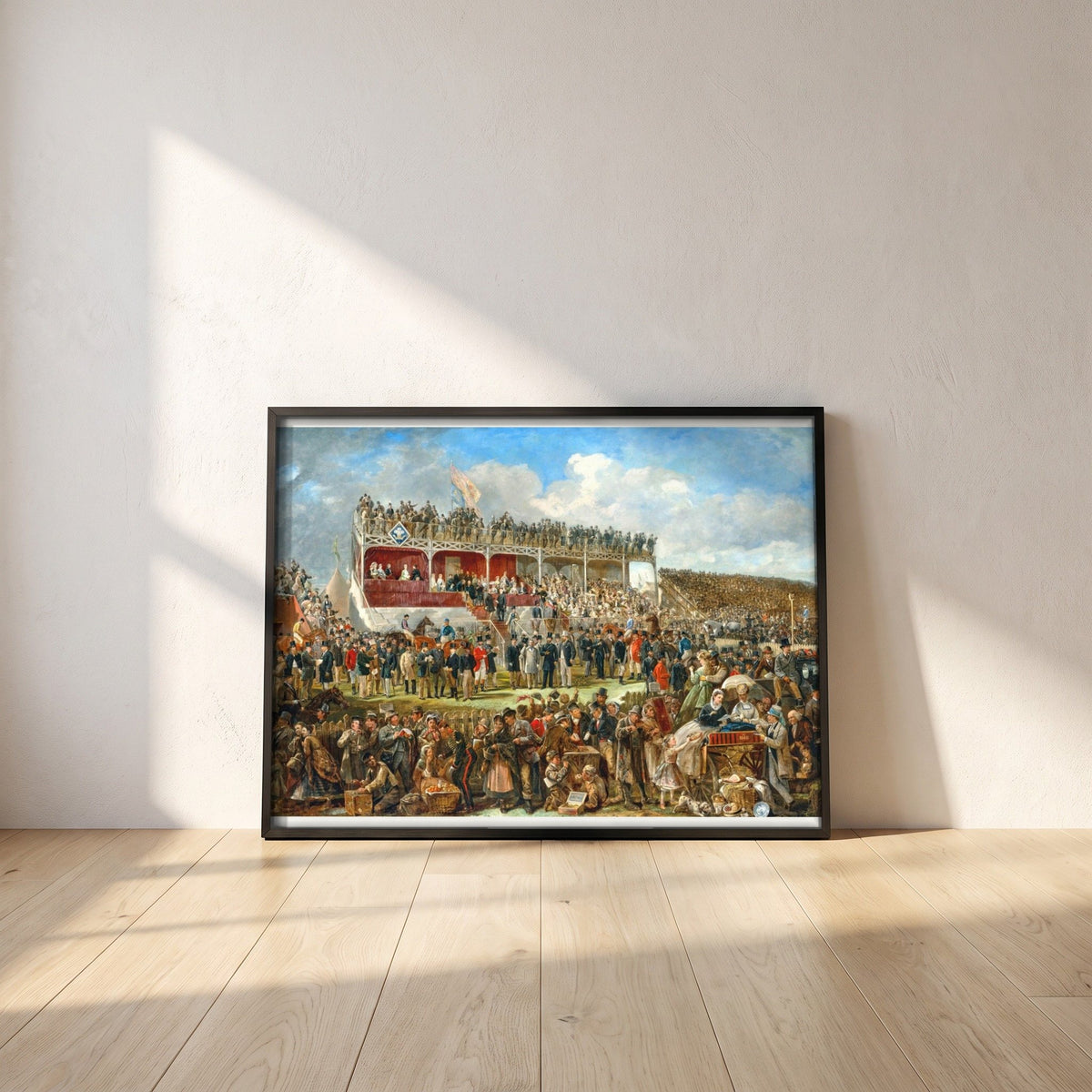 Punchestown Races by John Fergus O'Hea framed print in a black frame leaning against a white plaster wall on oak floorboards in morning light