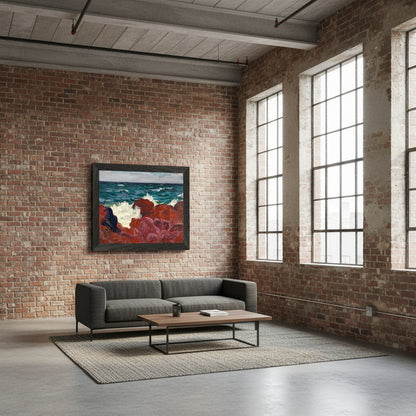Red Rocks and Sea framed print in a black frame on an exposed brick wall above a grey sofa in a loft