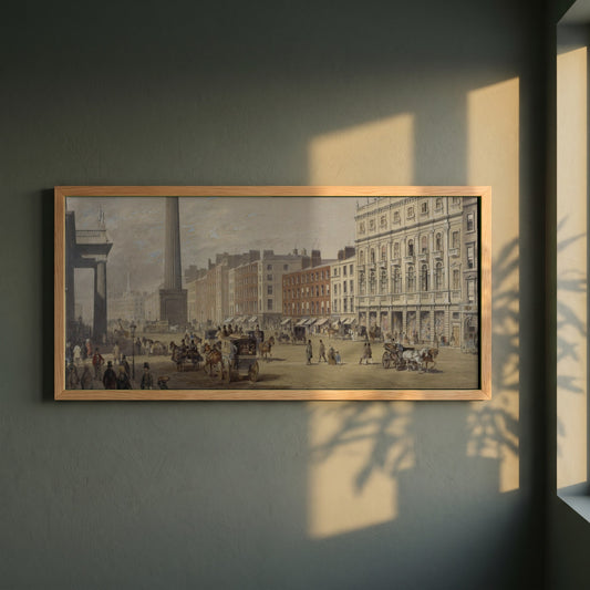 Sackville Street, Dublin framed print in a natural oak frame on a dark green wall beside a window, dappled plant shadow