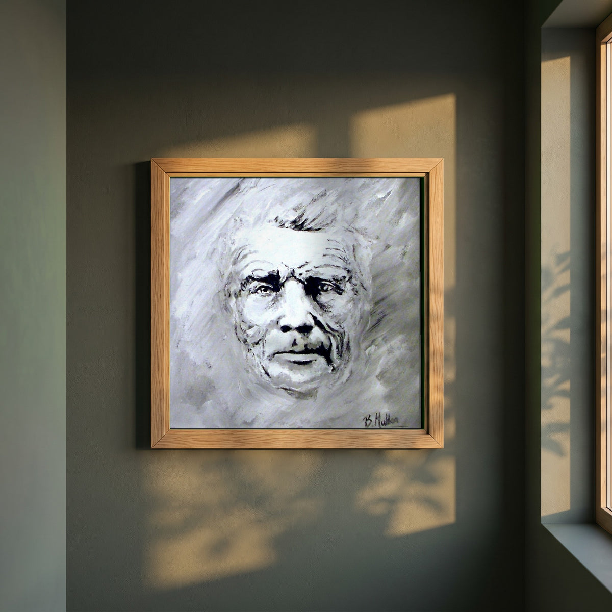 Samuel Beckett Portrait framed print in a natural oak frame on a dark green wall beside a window, dappled plant shadow