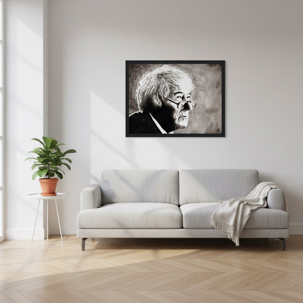 Seamus Heaney portrait framed print in a black frame above a grey sofa in a bright room
