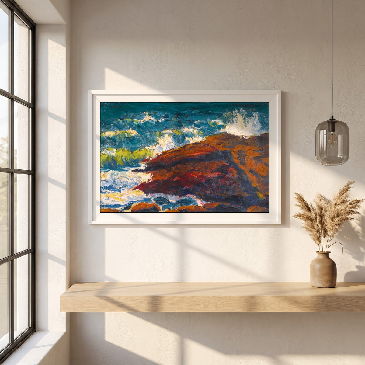 Seascape framed print in a white frame on a plaster wall above an oak worktop in a bright Scandinavian kitchen