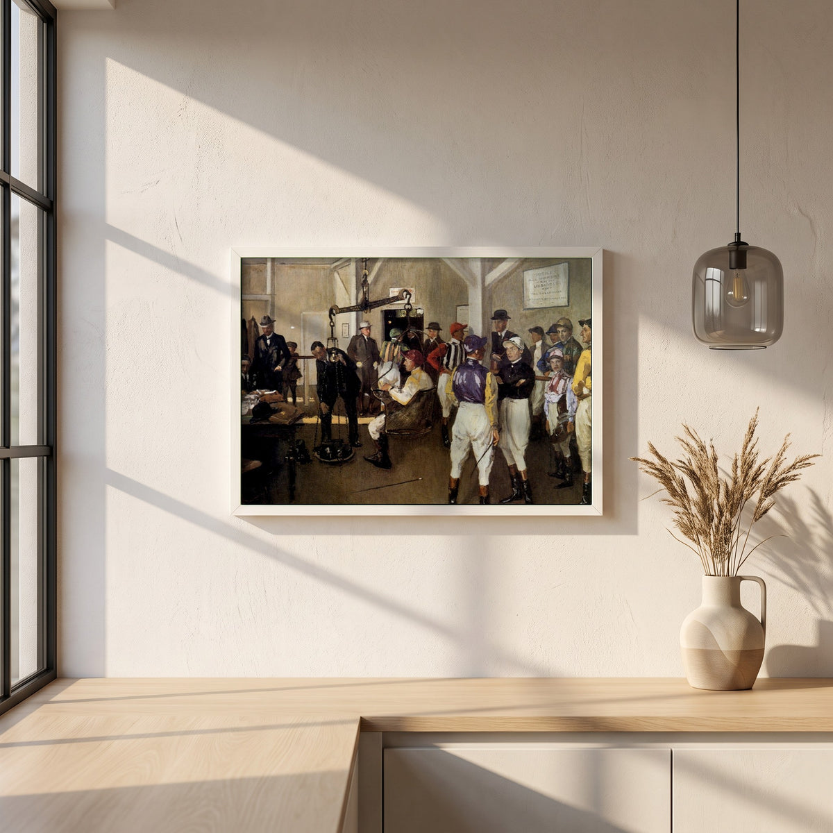 The Weighing Room, Hurst Park framed print in a white frame on a plaster wall above an oak worktop in a bright Scandinavian kitchen