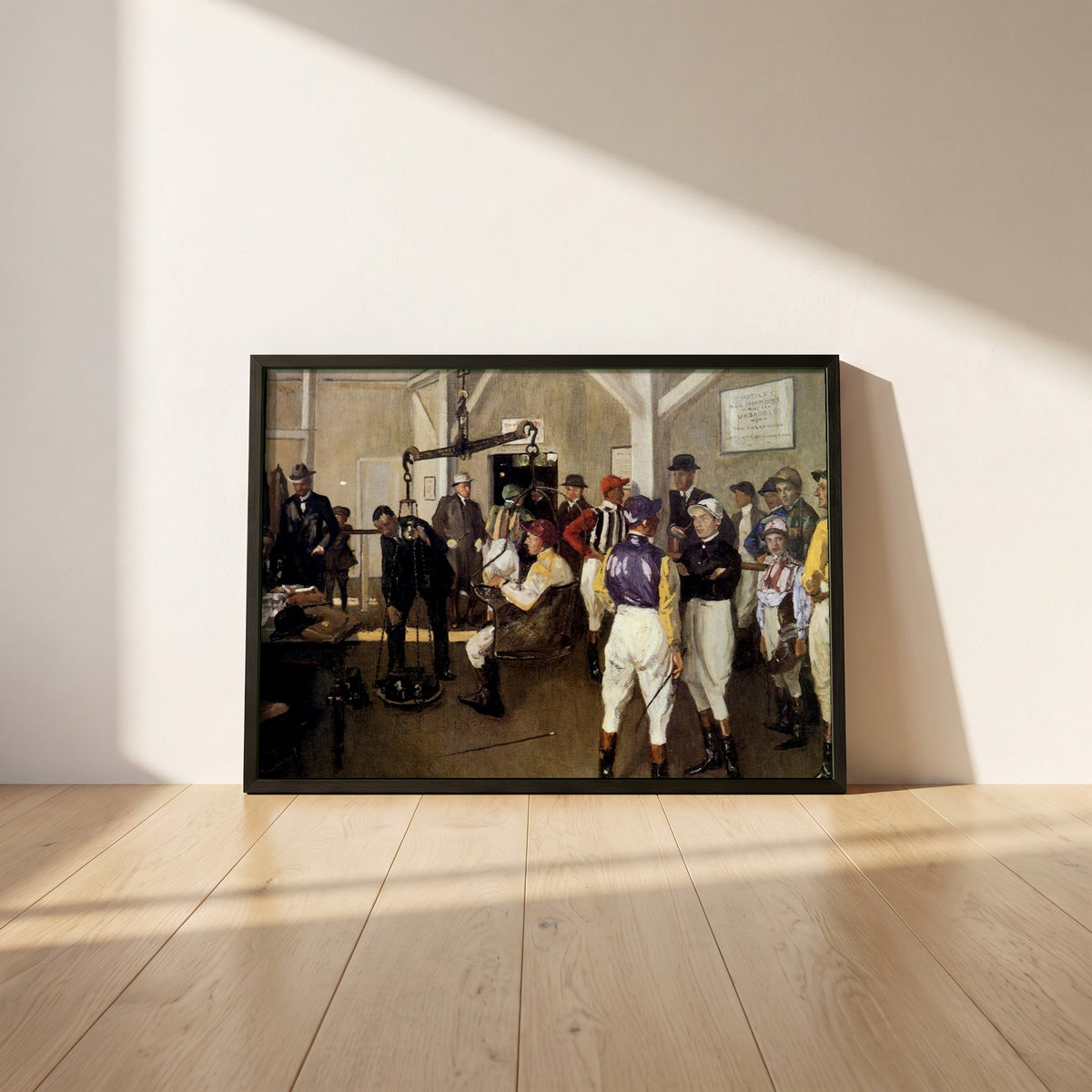 The Weighing Room, Hurst Park framed print in a black frame leaning against a white plaster wall on oak floorboards in morning light
