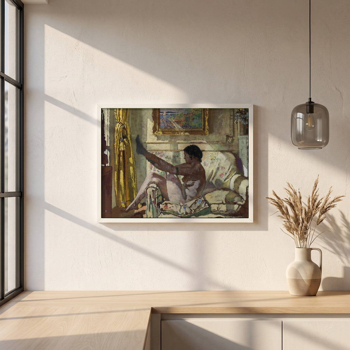 Sunlight framed print in a white frame on a plaster wall above an oak worktop in a bright Scandinavian kitchen